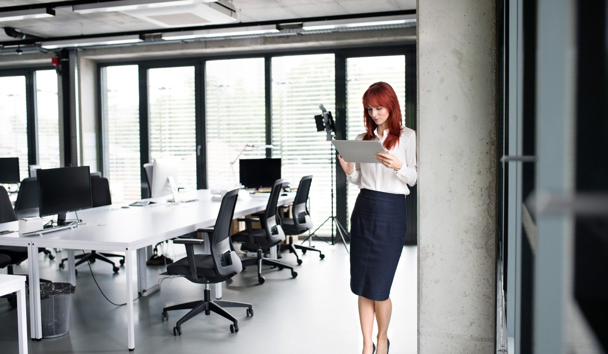 demo-attachment-32-Businesswoman-with-tablet-in-her-office-working.